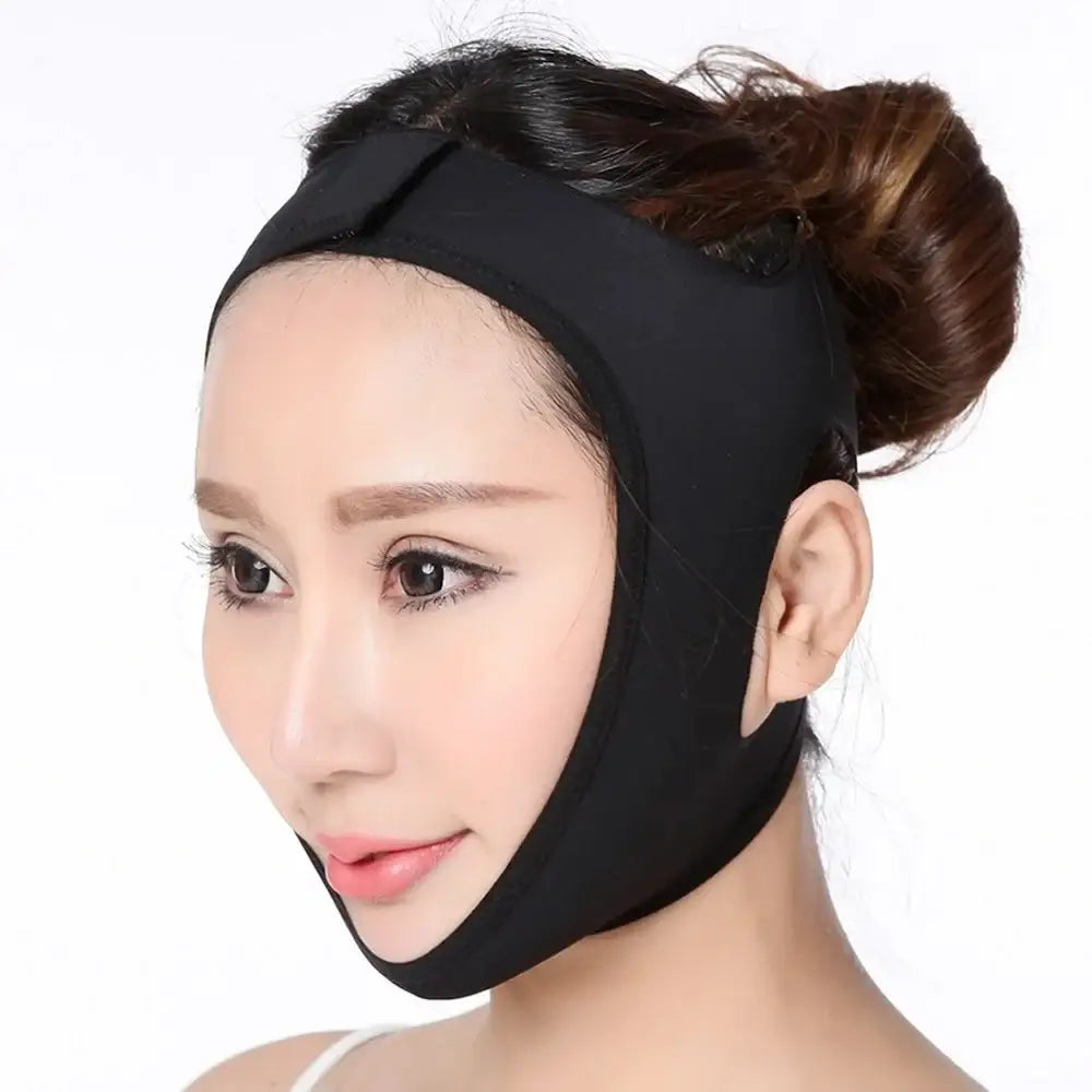 Face-slimming strap or chin wrap worn by a person.