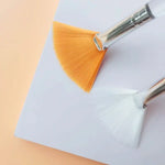 Fan Makeup Brush with Orange Bristles - Vignette | VogueBeautify