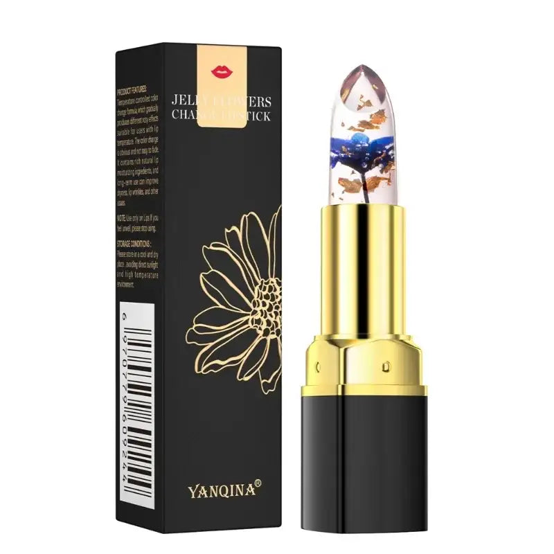 Decorative lipstick with a clear casing revealing a floral design inside.