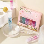 Floral Lip Gloss Set with Crystal Packaging - Vignette | VogueBeautify