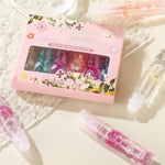 Floral Lip Gloss Set with Crystal Packaging - Vignette | VogueBeautify