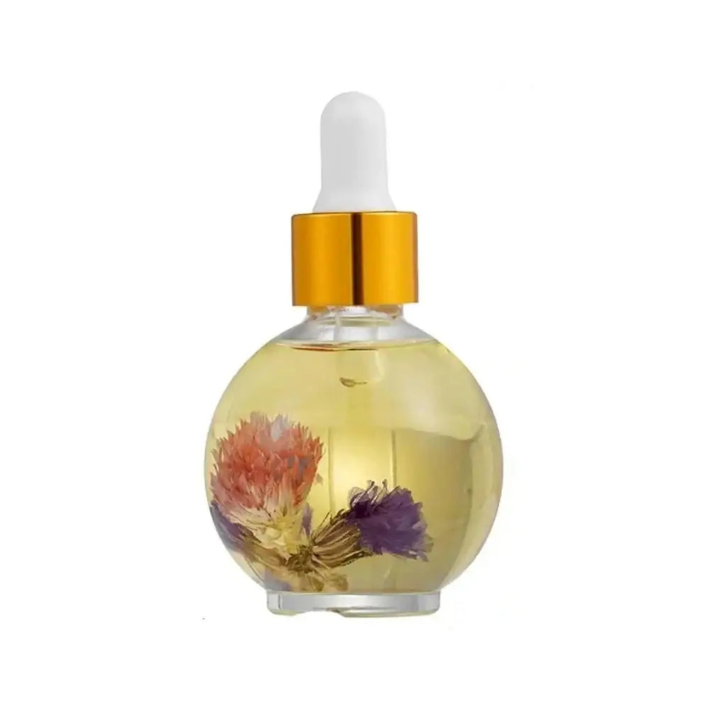 Glass bottle of yellow-tinted oil containing dried flowers, with a gold cap and dropper.