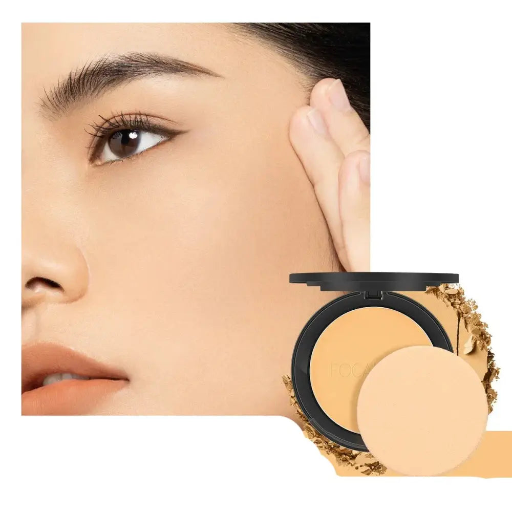 Compact powder makeup with an open case showing the pressed powder and mirror.