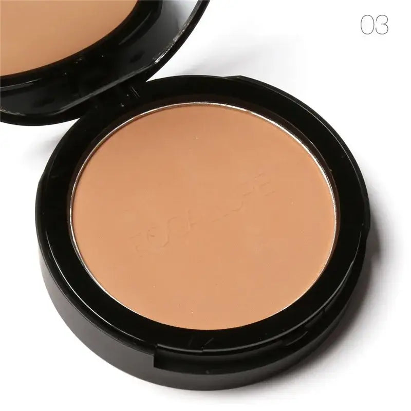 Compact powder makeup in a round black container with a beige-toned pressed powder inside.