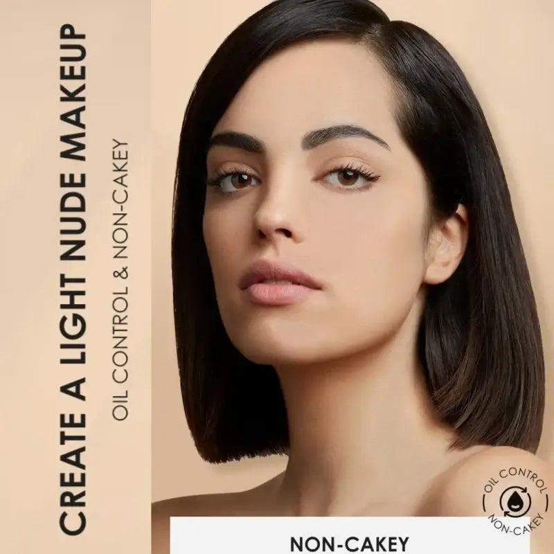 Portrait of a woman with dark hair and flawless makeup, advertising a light nude makeup product.