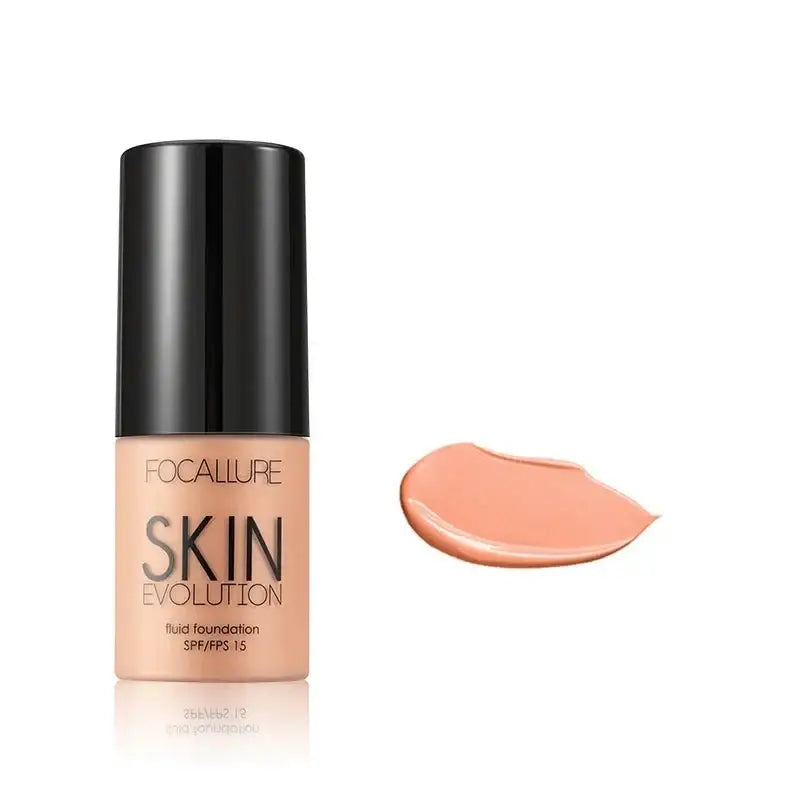 Bottle of liquid foundation makeup with a swatch of the product next to it.