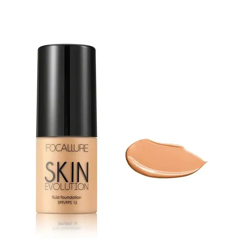 Bottle of liquid foundation makeup with a swatch of the product beside it.