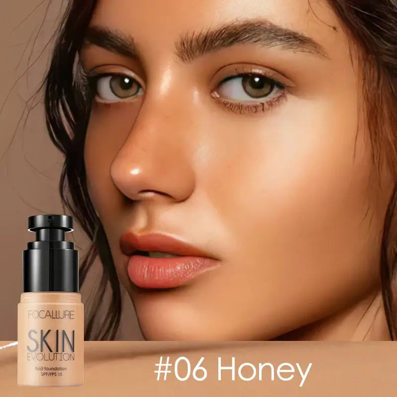 Bottle of liquid foundation makeup labeled ’#06 Honey’ next to a close-up of a woman’s face.