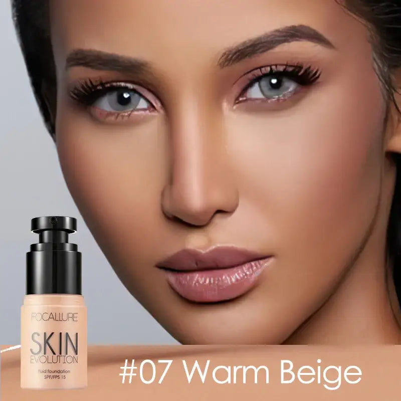 Close-up portrait of a woman’s face with flawless makeup and a foundation bottle in the foreground.