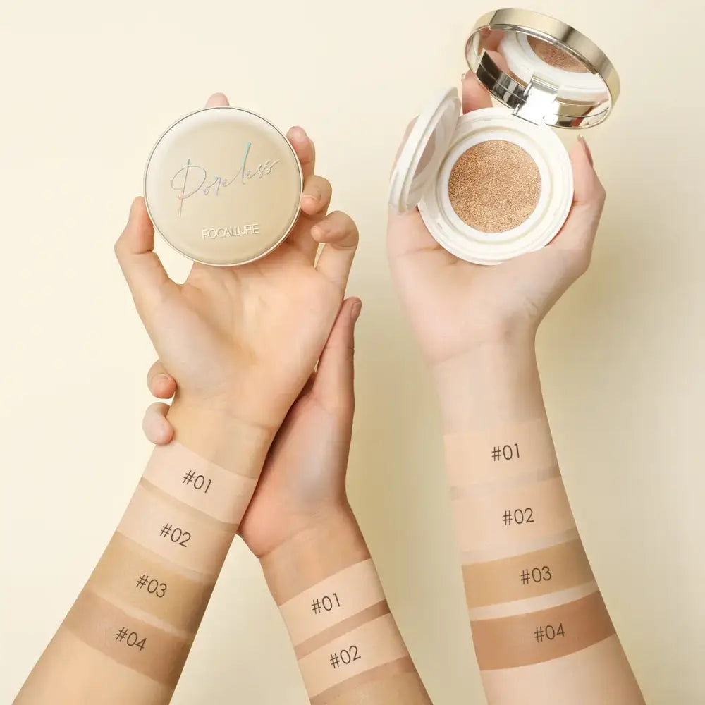 Makeup foundation compact with color swatches on arms demonstrating different shades.