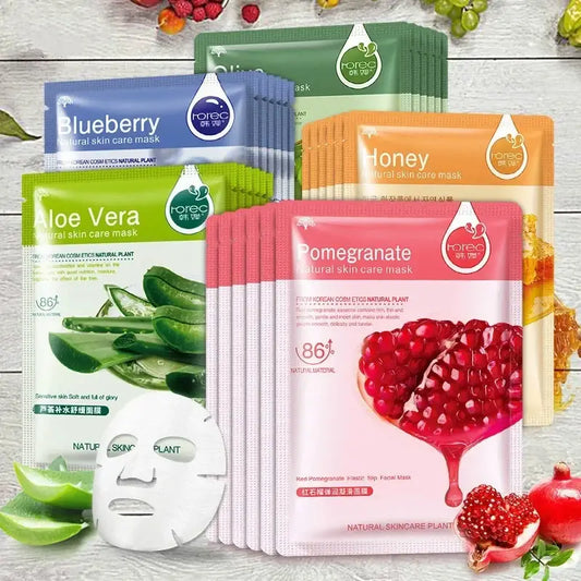 Collection of colorful sheet face masks featuring different fruit and plant ingredients.