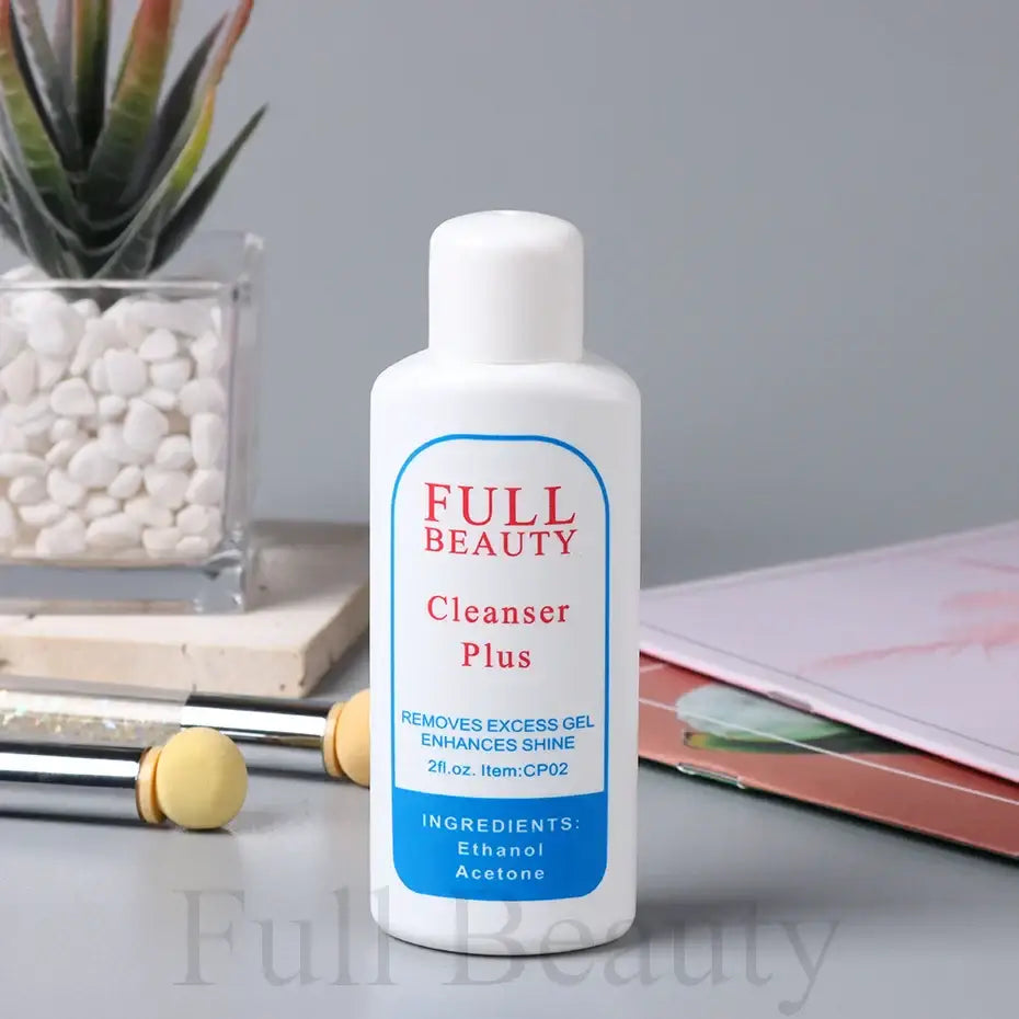 White plastic bottle of ’Full Beauty Cleanser Plus’ skincare product.