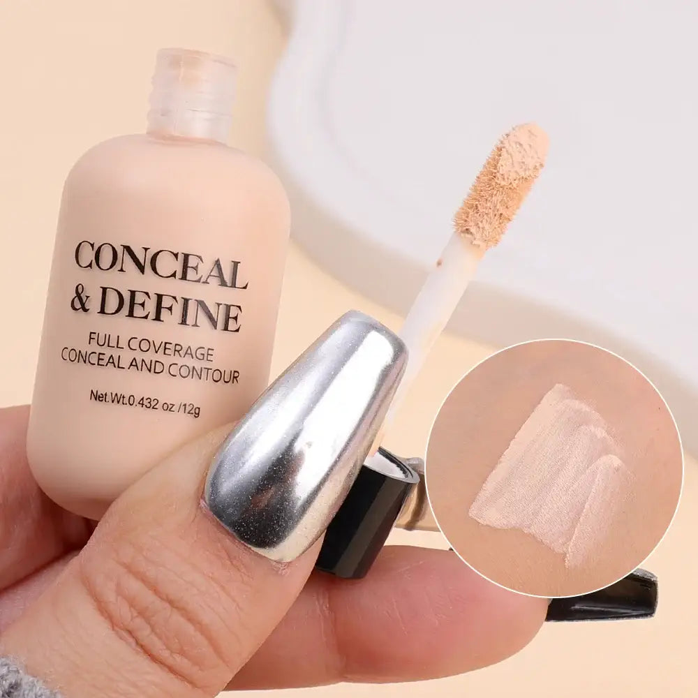 Bottle of ’Conceal & Define’ full coverage concealer and contour makeup with applicator wand.