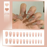 Glitter and Crystal Acrylic Nails with Butterfly Ring - Vignette | VogueBeautify