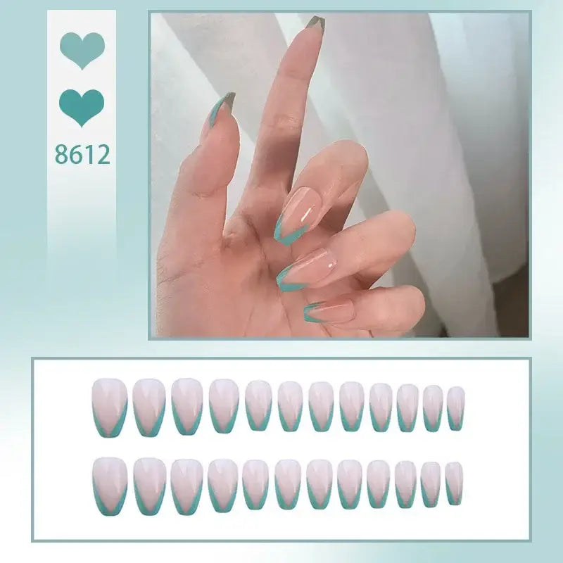 Hand with long, almond-shaped nails featuring a pink to teal ombre design.