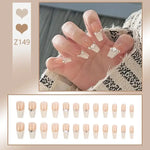 Glitter and Crystal Acrylic Nails with Butterfly Ring - Vignette | VogueBeautify