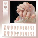 Glitter and Crystal Acrylic Nails with Butterfly Ring - Vignette | VogueBeautify