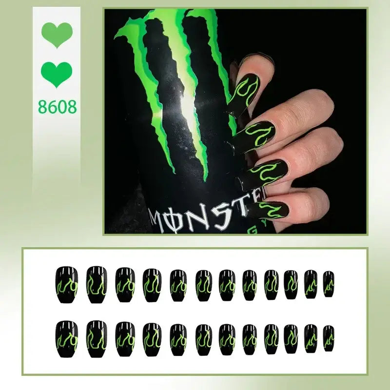 Monster Energy drink can held by a hand with matching green and black nail art.