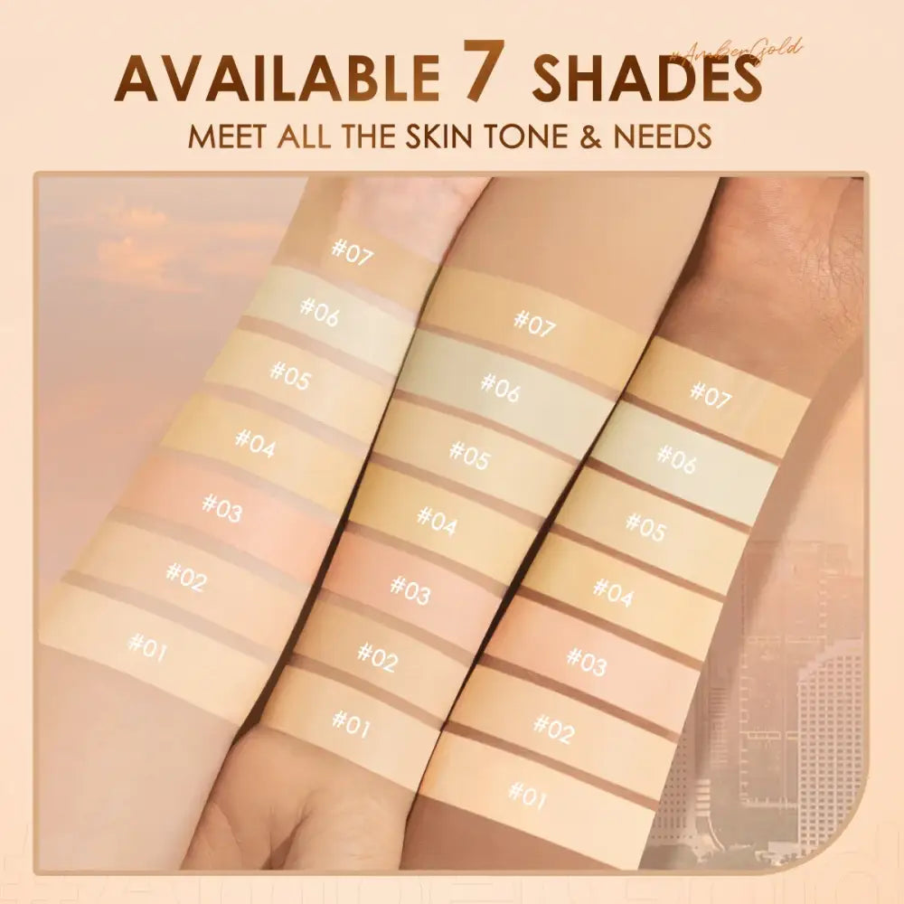 Swatches of foundation makeup in various skin tones displayed on an arm.