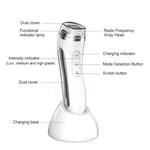 Golden Facial Beauty Device with Interchangeable Heads - Vignette | VogueBeautify