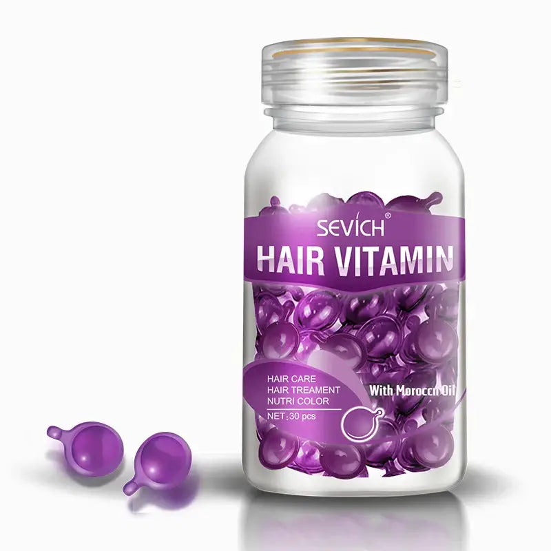 Clear bottle containing purple hair vitamin capsules.