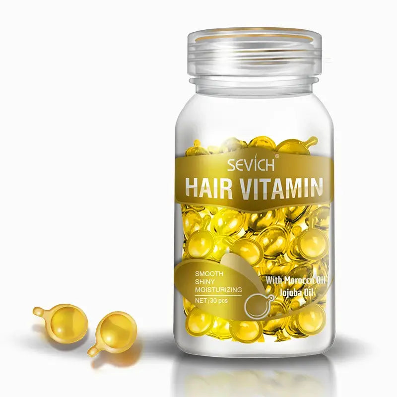 Clear bottle containing yellow hair vitamin capsules.