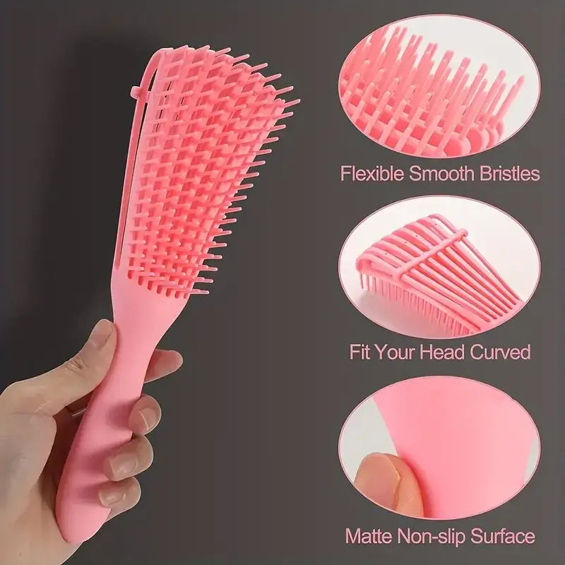 Pink detangling hairbrush with flexible bristles and an ergonomic handle.