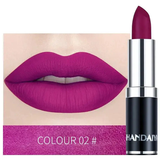 Vibrant magenta lipstick with a matching lip swatch.