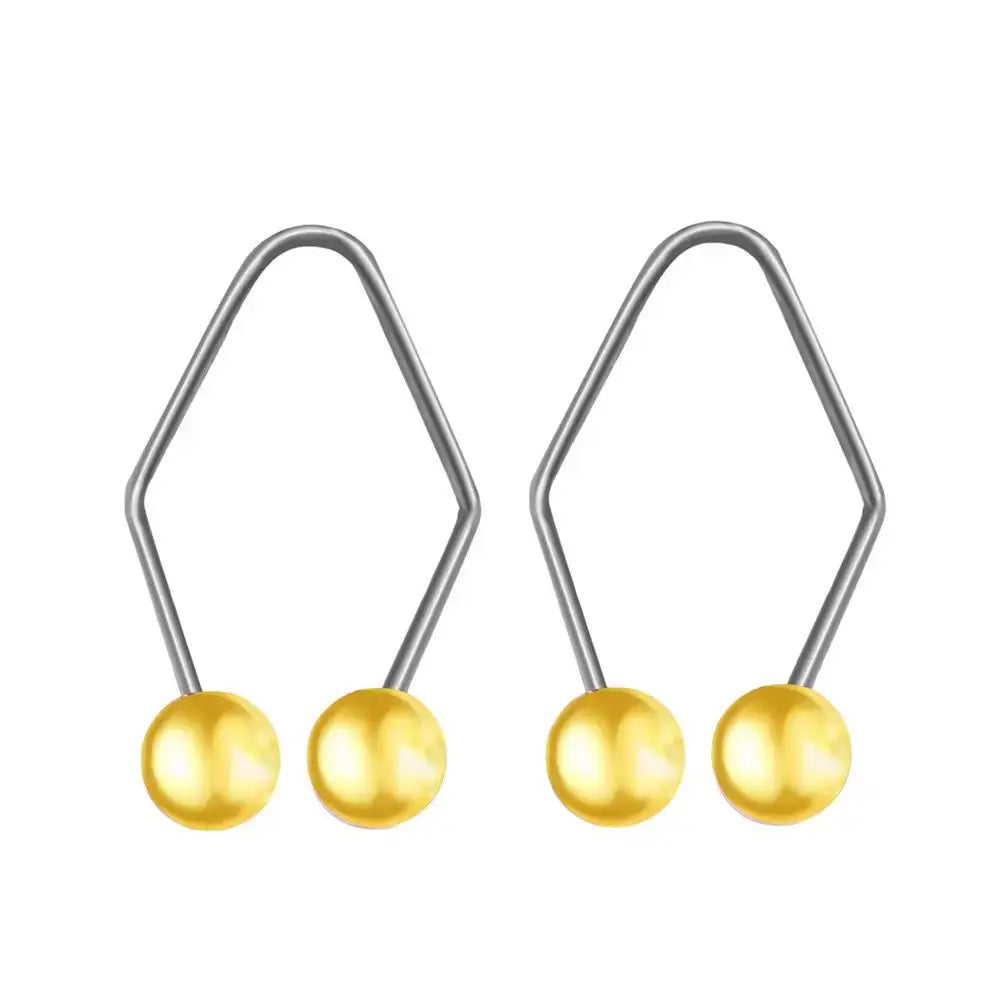 Pair of silver hexagonal earrings with gold spheres at the ends.