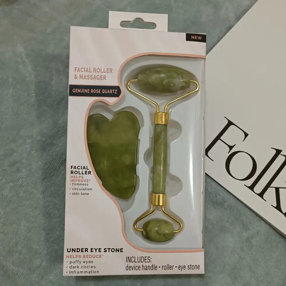 Facial roller and gua sha tool set made of green jade or stone.