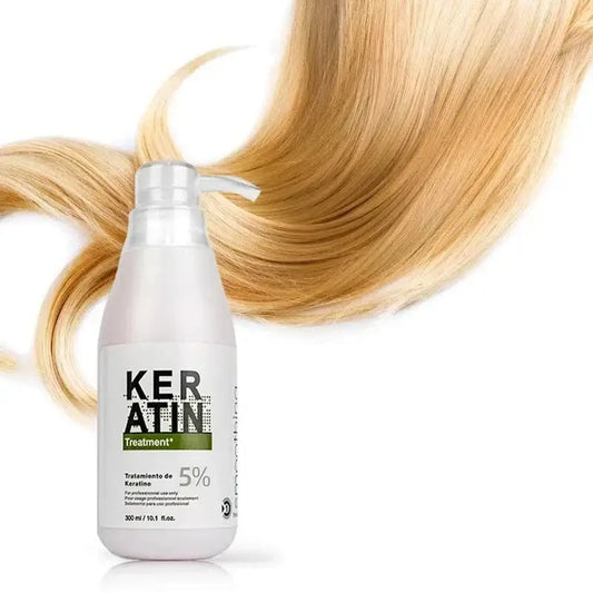 White bottle of Keratin hair treatment product with blonde hair strands behind it.