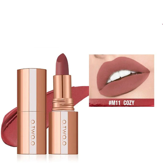 Rose gold lipstick tube with a matte mauve shade and accompanying lip swatch.