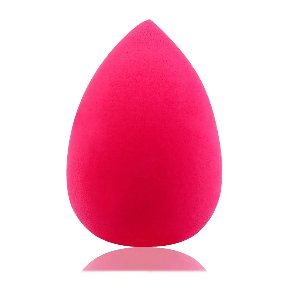 Bright pink, teardrop-shaped makeup sponge or beauty blender.