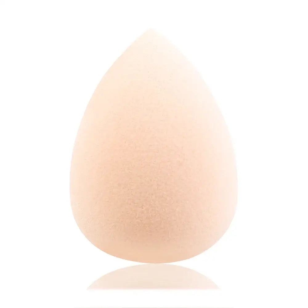 Bright pink, teardrop-shaped makeup sponge or beauty blender.