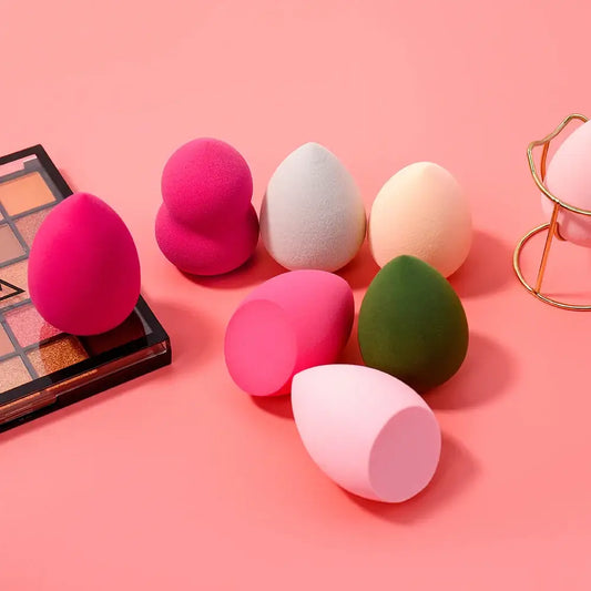 Colorful makeup sponges in various shapes and hues.