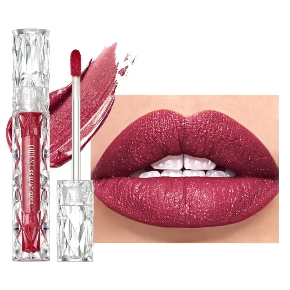 Lipstick tube and swatch next to lips wearing deep burgundy lip color.