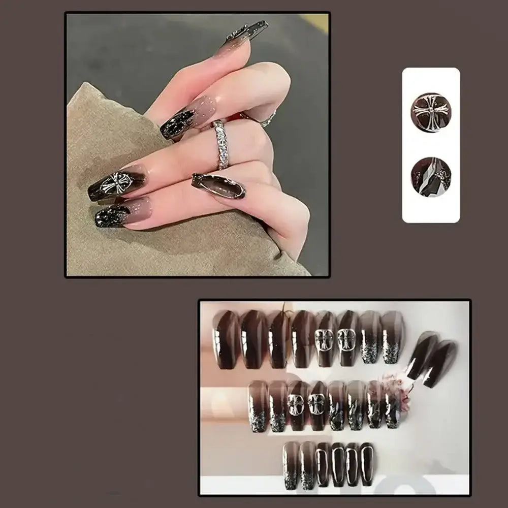 Stylized black nail extensions with intricate silver designs and patterns.