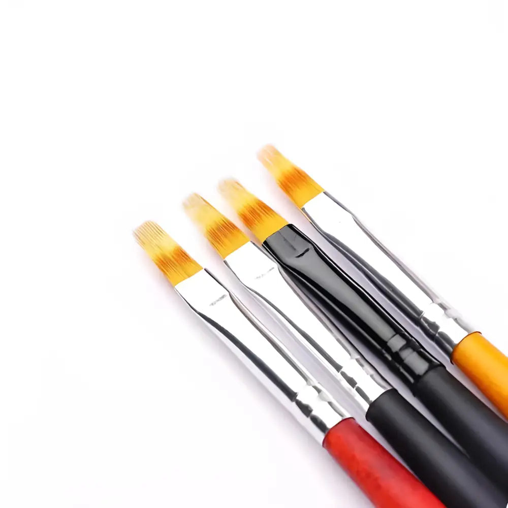 Set of paintbrushes with different colored handles and yellow bristles.