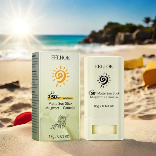 Sunscreen stick product with SPF 50+ protection displayed on a beach.