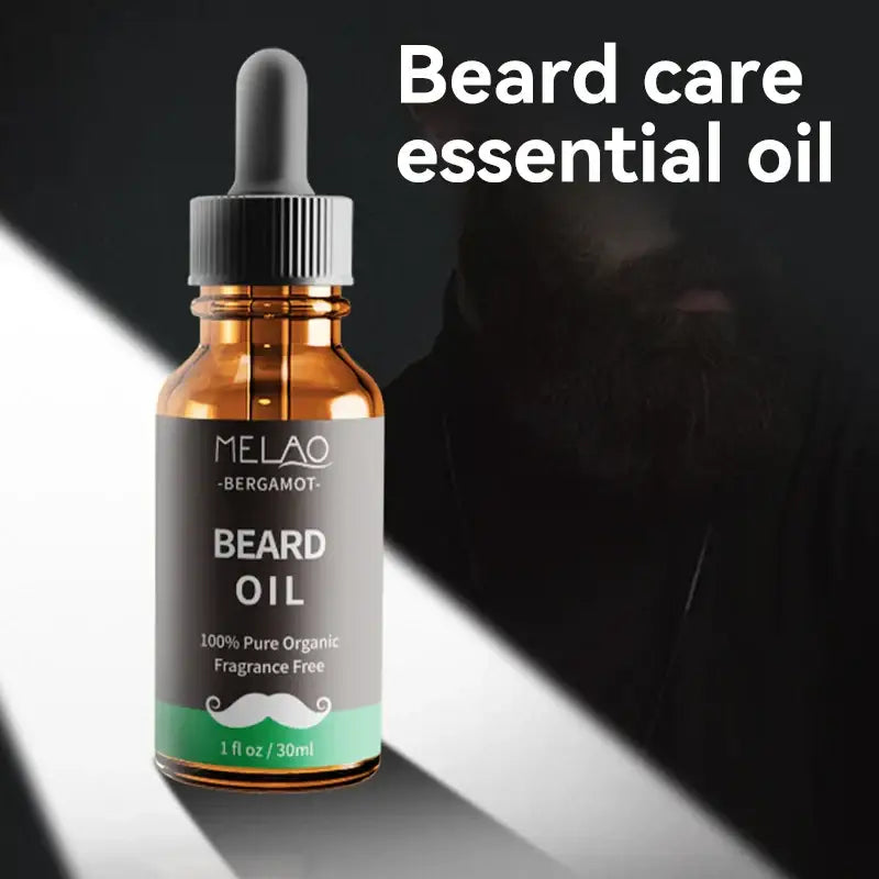 Amber glass bottle of beard oil with a dropper cap and product label.