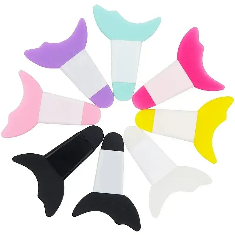 Colorful silicone mermaid tail covers for swimming fins.