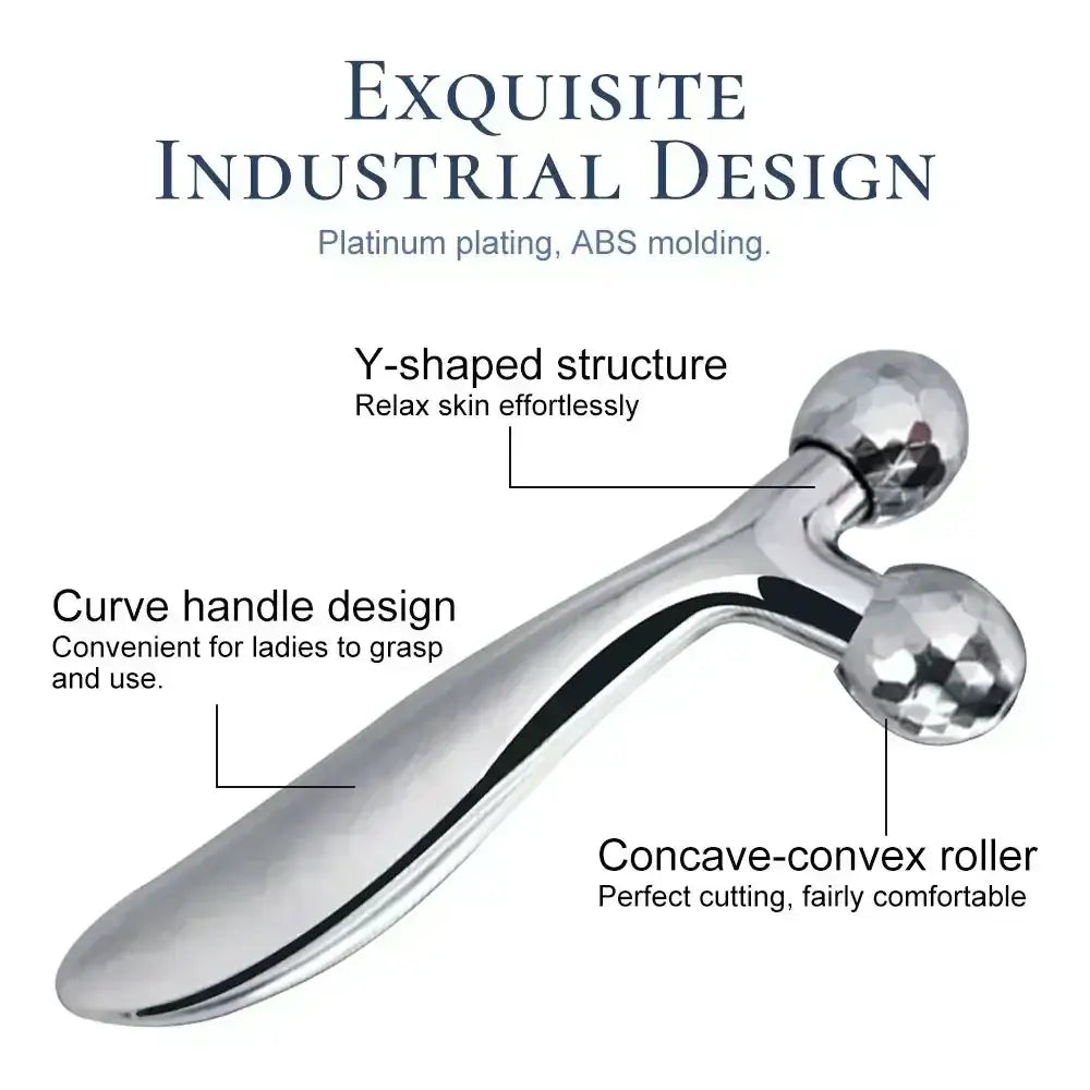 Metallic facial massage tool with a Y-shaped structure and curved handle.