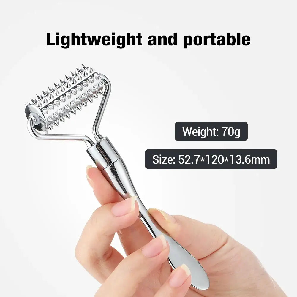 Handheld metal roller with spikes for facial massage or skincare.