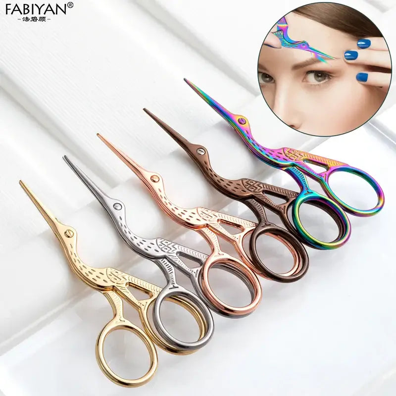 Decorative stork-shaped scissors in various metallic colors.