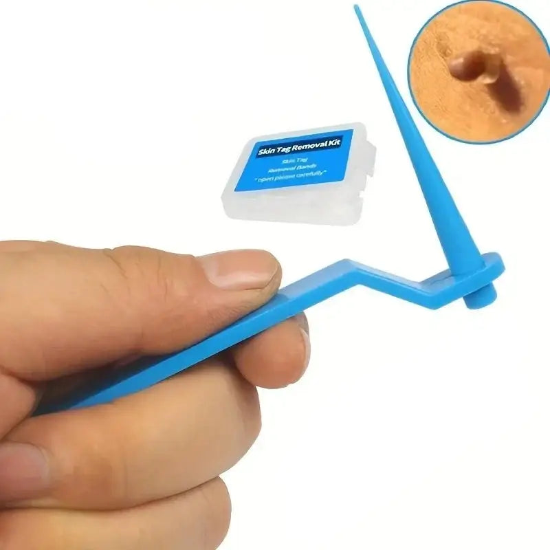 Blue plastic dental floss pick held between fingers.