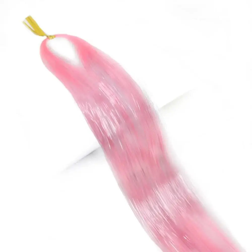 Pink banana-shaped object with a fuzzy or furry texture.