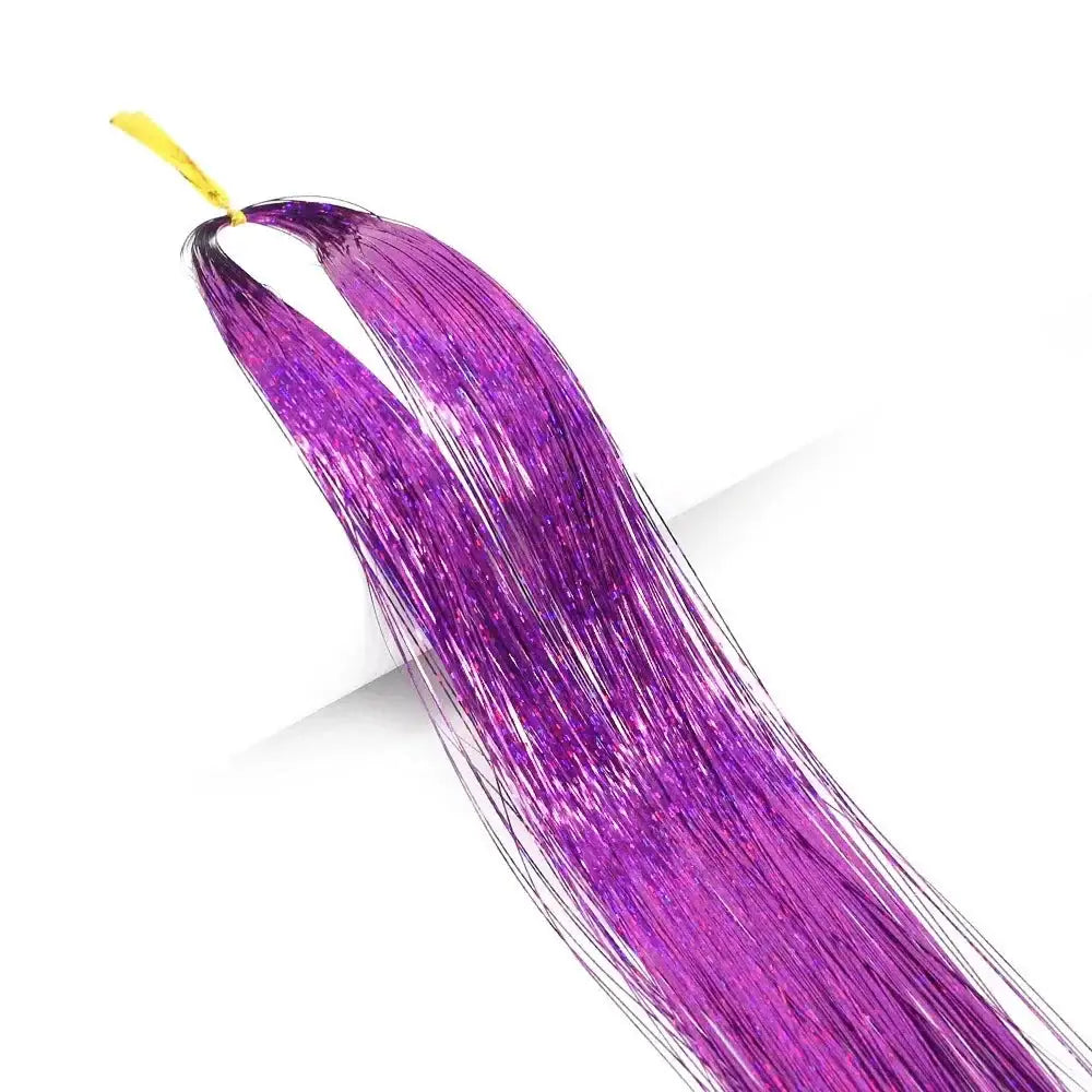 Vibrant purple hair extension or synthetic hair piece with a yellow attachment clip.