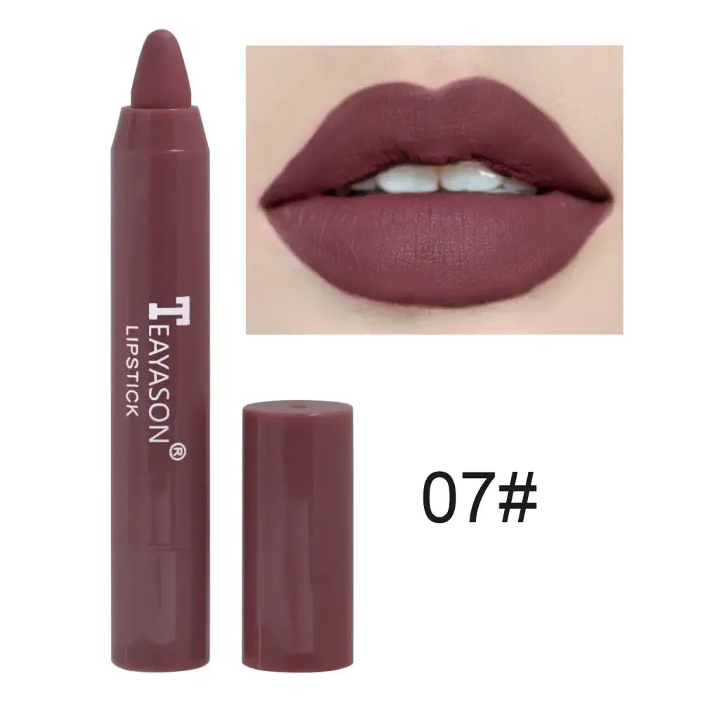 Matte mauve lipstick in pencil form with corresponding lip swatch.