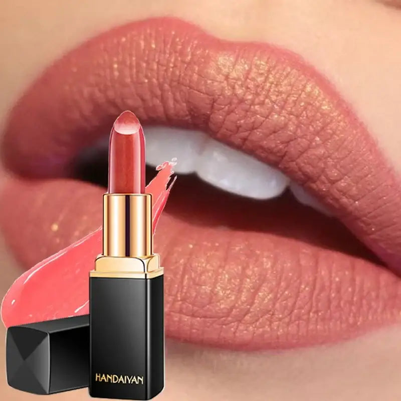 Lipstick in a black and gold tube next to a close-up of lips wearing similar colored lipstick.