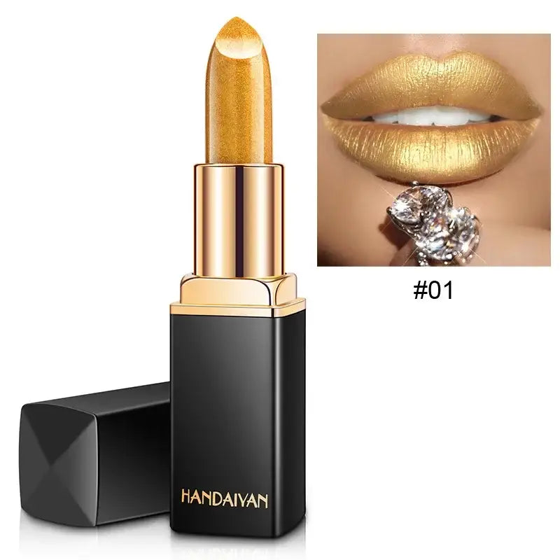 Gold metallic lipstick in a black and gold tube.